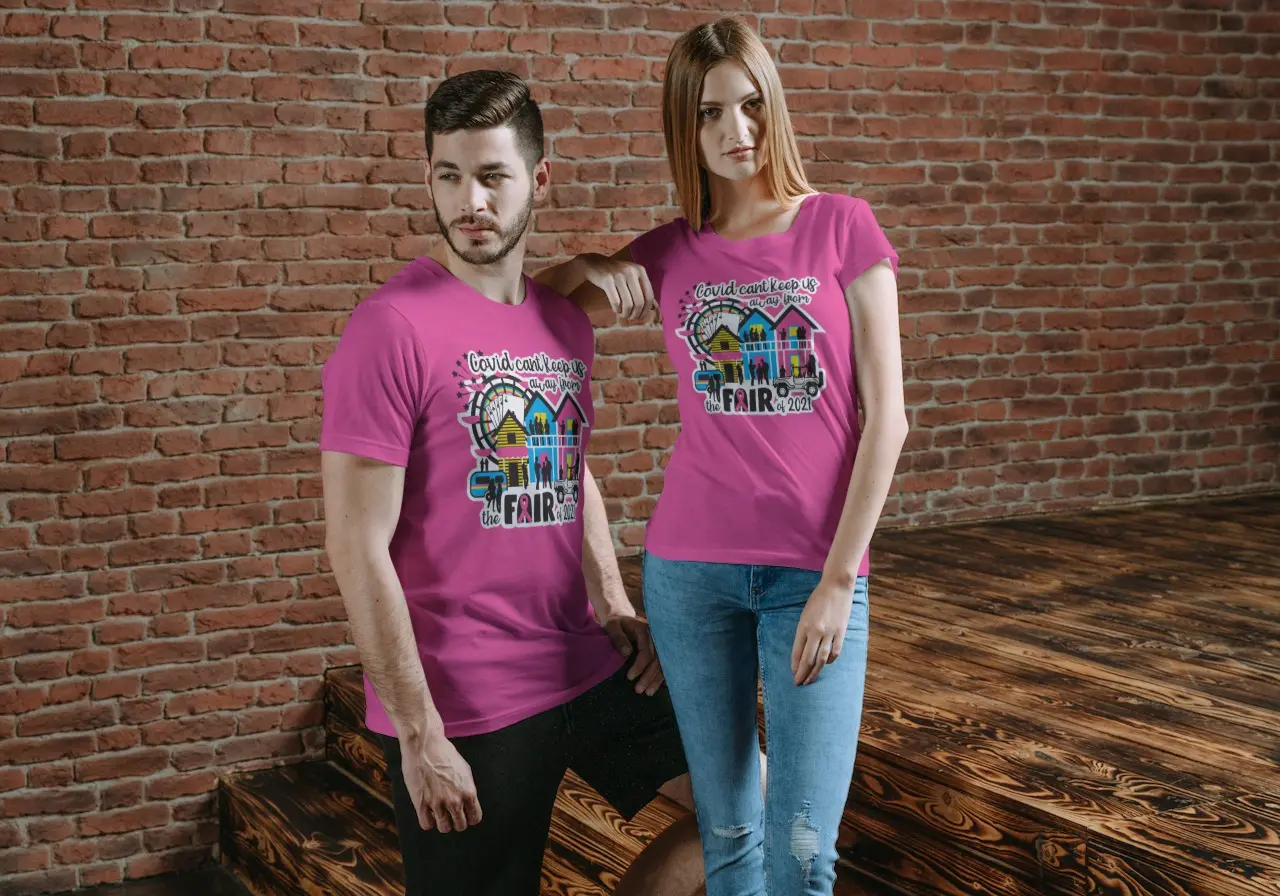 Man and woman wearing NCF shirts